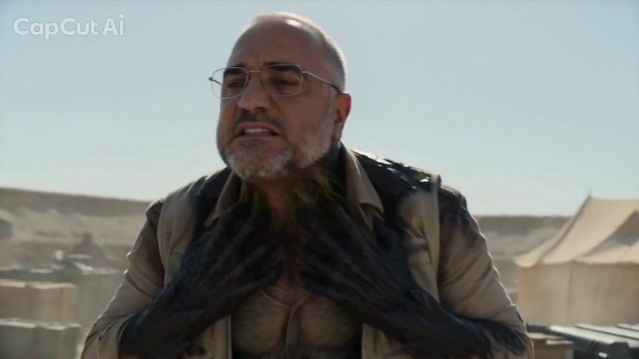 Black venom veins spread across his hands and chest