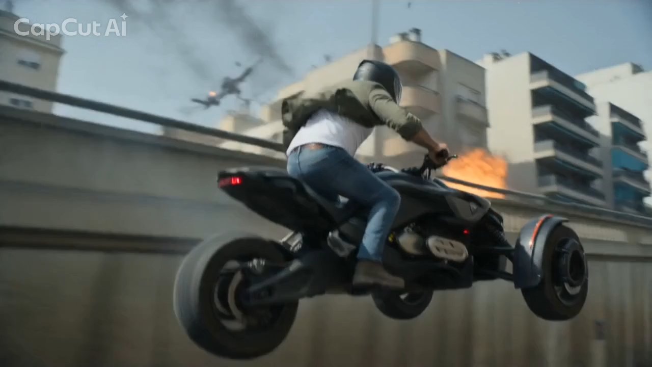 Fully airborne as the wreck burns behind